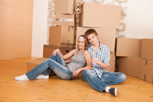 Office relocation planning in Belsize Park with business moving boxes and equipment