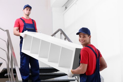 A customer service representative reviewing a complaint for a moving service