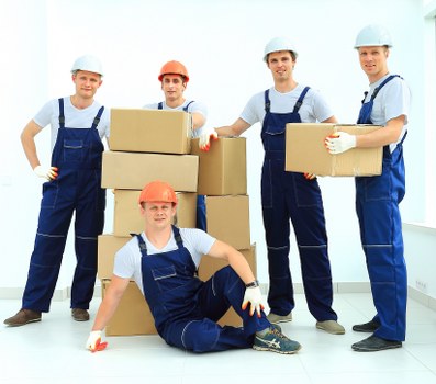 Removal van and movers handling a flat move near Belsize Village
