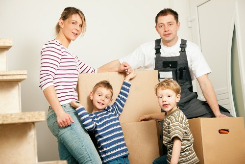 Removal team planning a move in Belsize Park with boxes and furniture