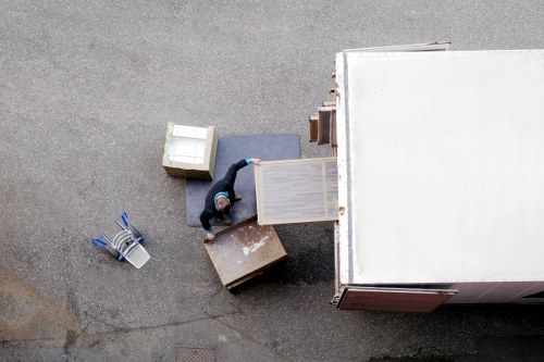 Furniture and boxes being loaded into a moving van