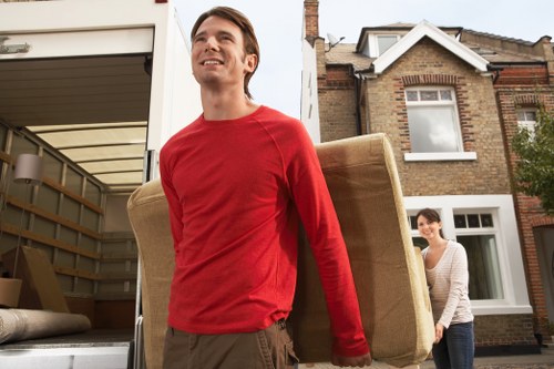 Packed boxes and household items prepared for transport by van