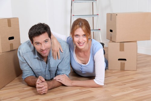 Team handling furniture during a move in Belsize Park
