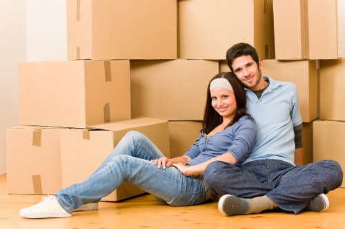 Worker assessing moving risks before loading