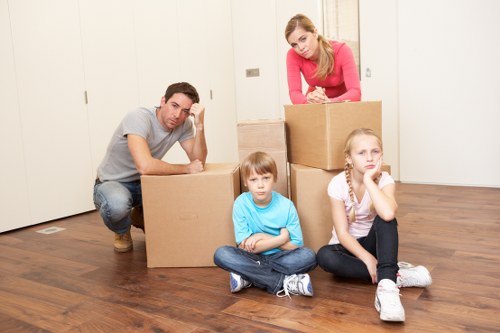 Packed boxes and wrapped household items ready for removal