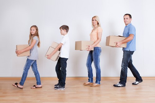 Careful furniture moving in a Belsize Park residential property with stairs and narrow access
