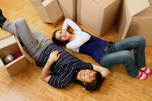 Packed boxes and furniture ready for a local removals service